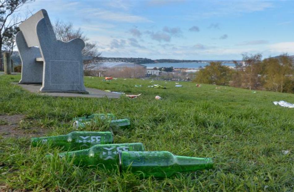 Alcohol bottles and other rubbish left by physical education students partying at Bracken View,...