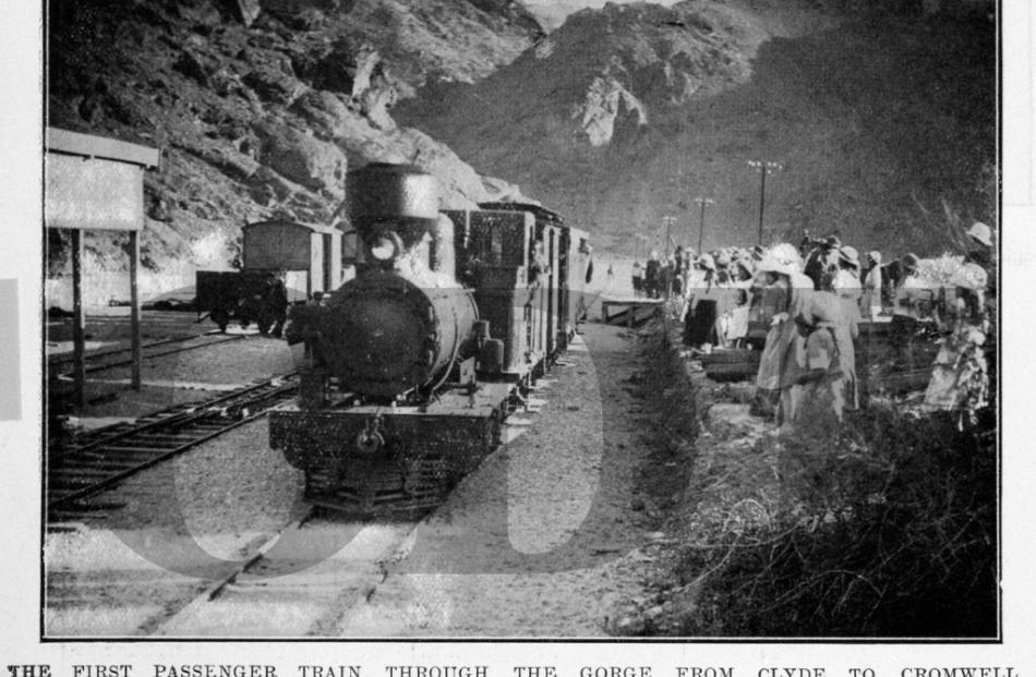Otago Witness, 1918. The first passenger train through the gorge from Clyde, arrives at Cromwell