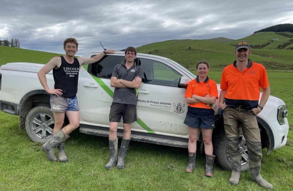 Cleaning flood debris from a farm in South Otago  are Lincoln University students and Handy...
