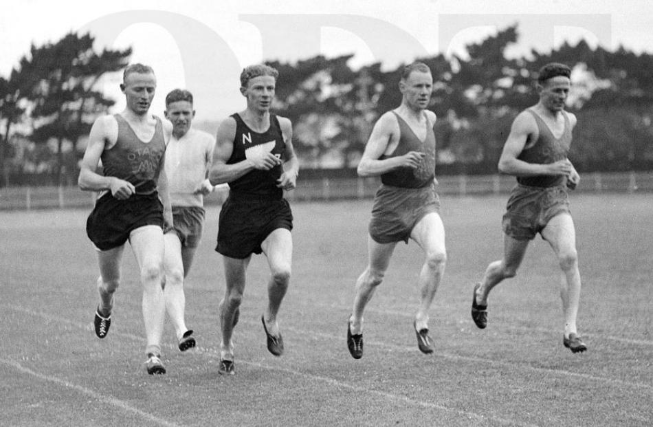 Published in December 1936. Style of a champion . . . Olympic 1500m champion Jack Lovelock warms...