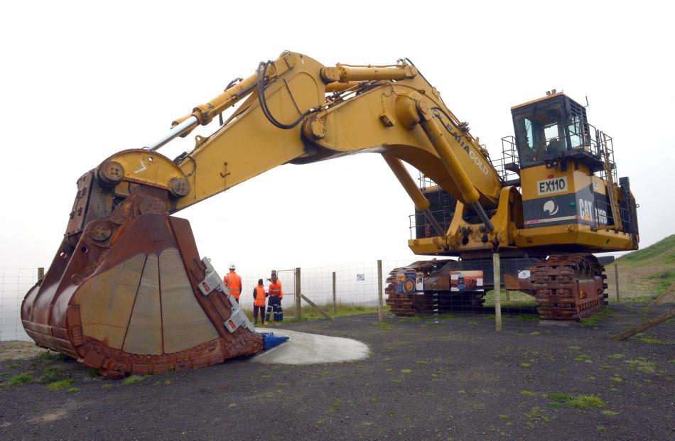 A retired Cat EX110 excavator sits idle at OceanaGold’s Macraes gold mine.
