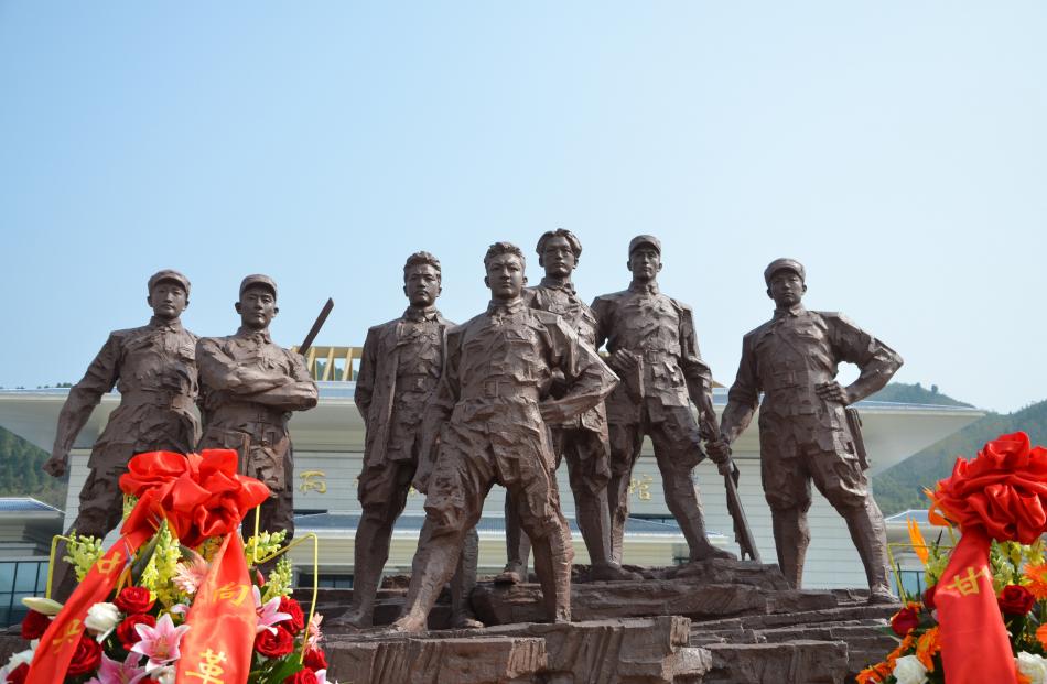 A 3.2m-tall representation of People's Republic of China president Xi Jinping's father standing...