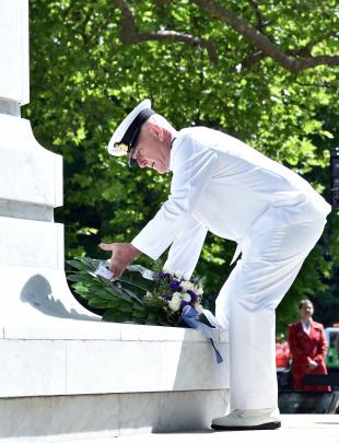 Royal New Zealand Navy Reserve Lieutenant Peter Gee, based at HMNZS Toroa, lays a wreath at the...