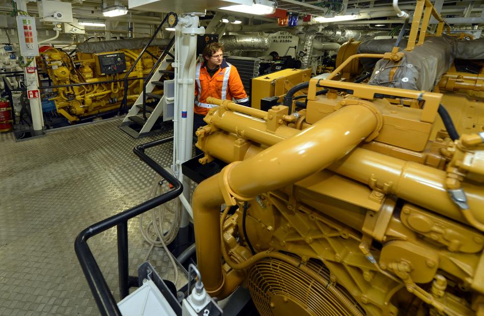 Port Otago engineer Richard Ogier starts engines on  Taiaroa.