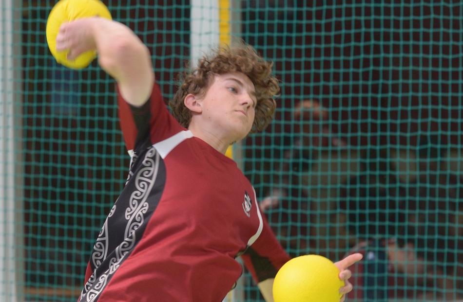 James Fagerlund, 14, from Logan Park High School, winds up during a dodgeball game.
