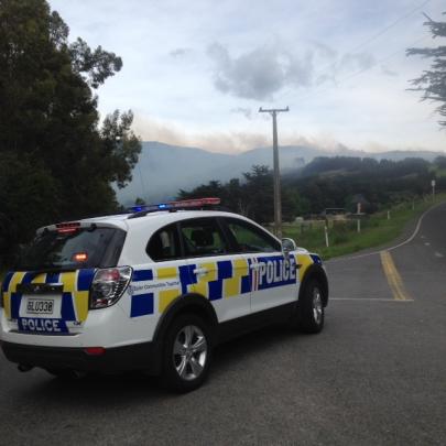 Police car on SH87. Photo by Stephen Jaquiery.