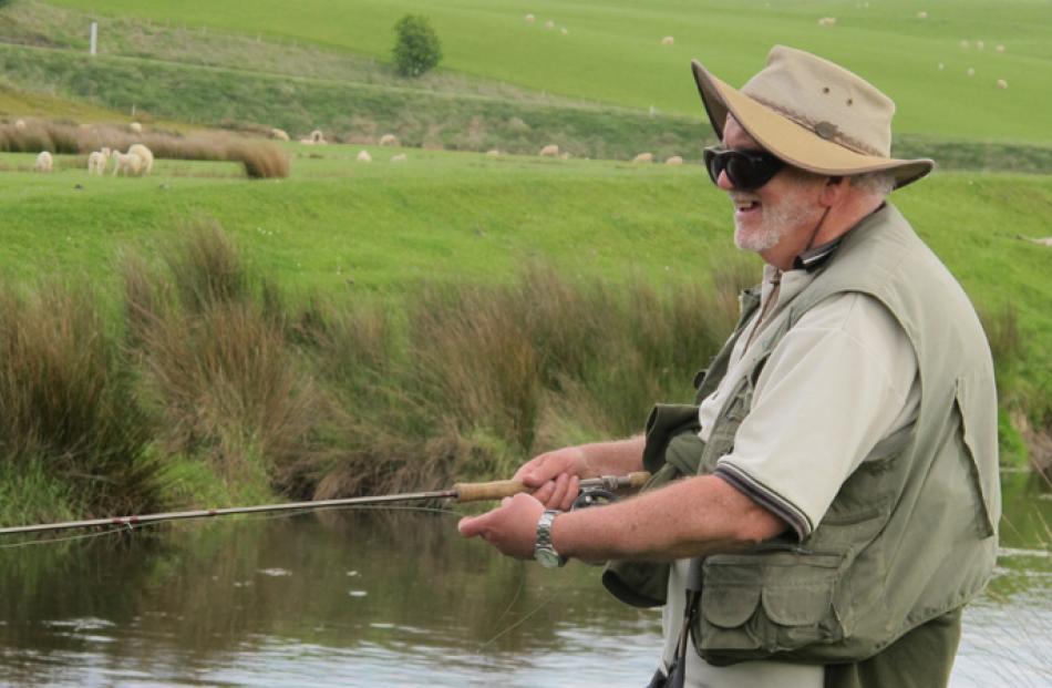 Slow going ... The trout fishing was tough for Mike Sawyer, of Dunedin, as he fished his fourth...