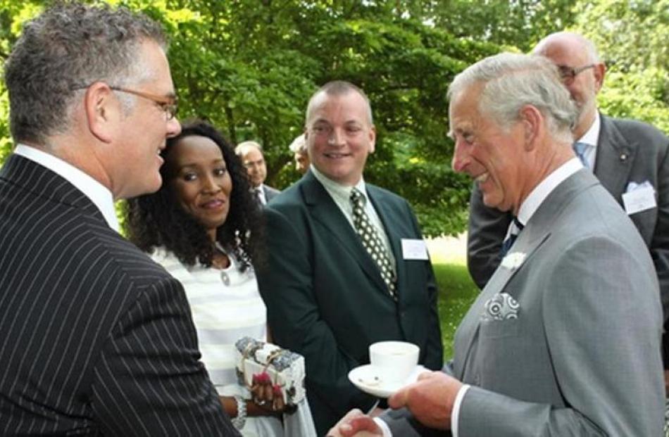 Craig Smith chats to Prince Charles during a Campaign for Wool promotion at Clarence House.