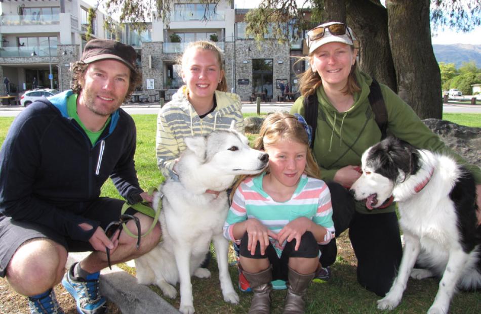 Luke, Neve (10), Eden (6), and Hannah Faed, of Wanaka, with husky Aiyana and border collie Firn.
