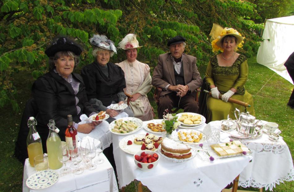 Preparing for afternoon tea are (from left) Lyn Gray, Jenny Lynch-Blosse, Sara Elliott, Ron Daw...