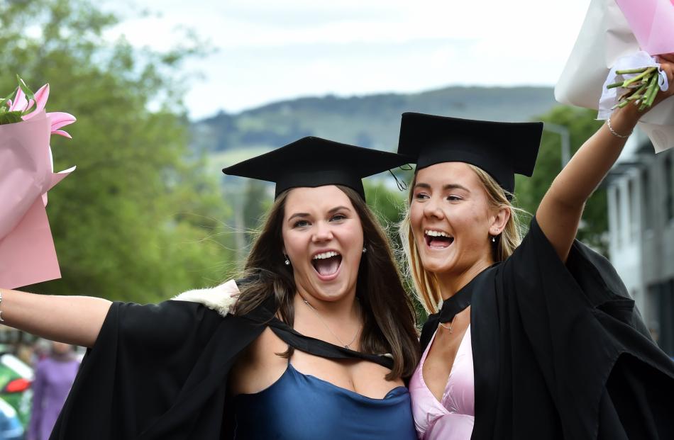 Zanthie Smith (left) and Olivia Jowsey, both 20, of Christchurch, celebrate the beginning of a...