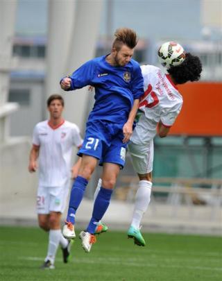 Southern United midfielder Nick Hindson contests possession with Waitakere United's Dylan...