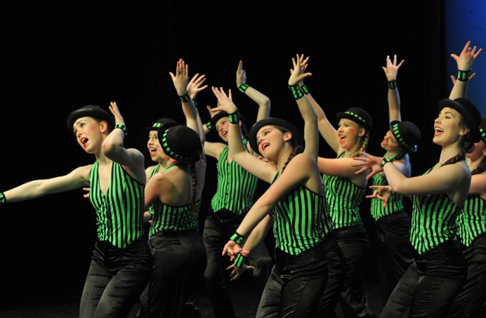 Performers from the Denise Henderson School of Tap thrill the audience.