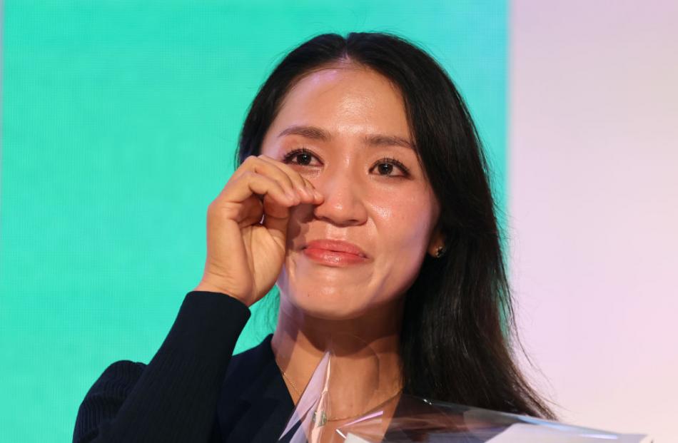 New Zealand golfing great Lydia Ko reacts after being recognised for her qualification into the...