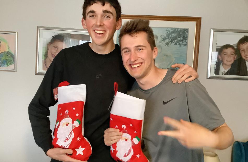 Early Christmas celebration ... Jackson Gallagher, 20, and Jonty Wispinski, 24, received their...