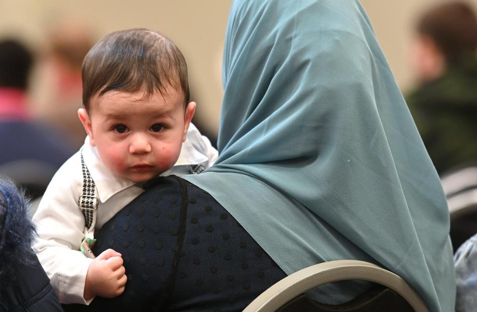 Ameer Al Turk, 6 months, and I shared a moment as his family became New Zealand citizens at a...