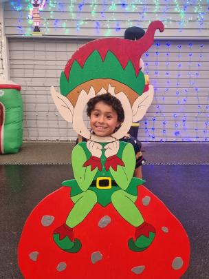 Santa’s little helper ... Charlie Downes, 7, has some fun at Santa’s workshop in Mosgiel. PHOTO:...