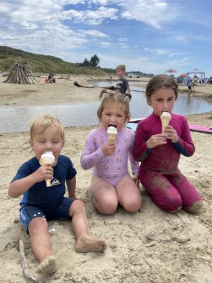 Summer treat ... Cousins (from left) Gus Ryan, 2, Frankie Ryan, 3, and Finlay McDiarmid, 6, enjoy...