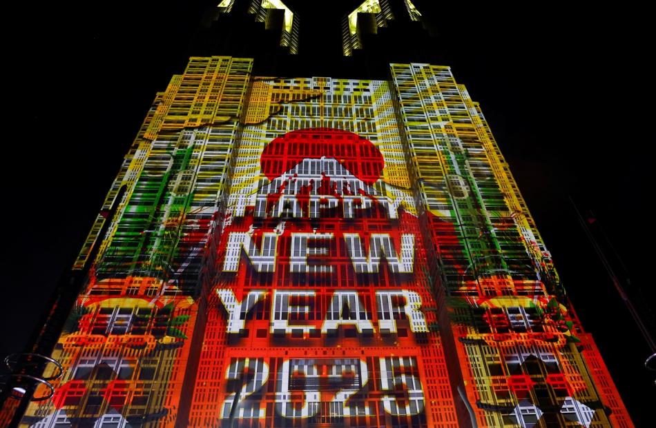 A New Year projection on the Tokyo Metropolitan Government building in Japan. Photo: Reuters