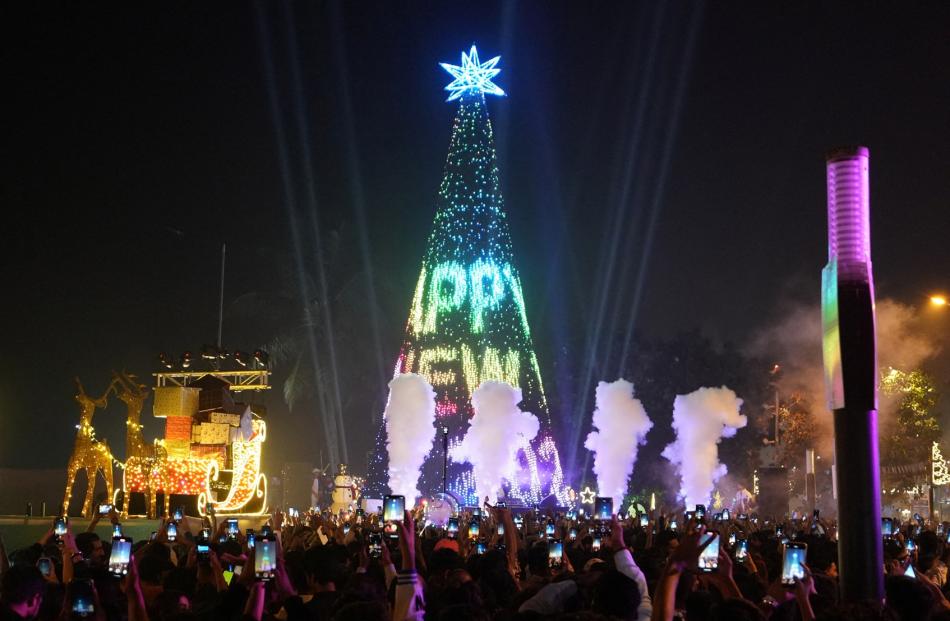 People attend New Year’s Eve celebrations in Mumbai, India. Photo: Reuters
