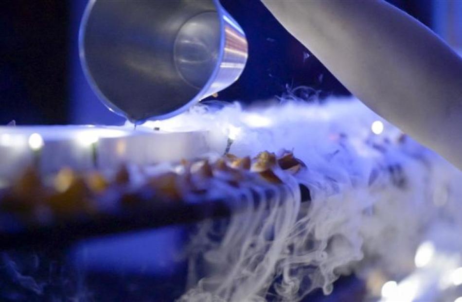 Hot water is poured over dry ice at Technique restaurant.