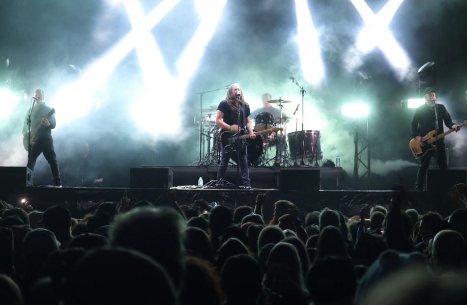 Shihad members (from left) Phil Knight, Jon Toogood, Tom Larkin and Karl Kippenberger launch into...