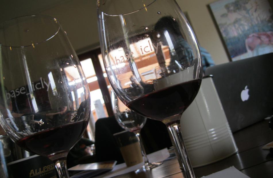 Tasting portions of pinot noir.