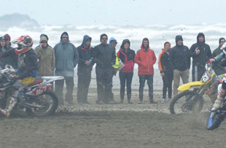 Number 12 Jason Feaver of Christchurch rides Honda CR 600 during the Burt Munro challenge 2014 at...
