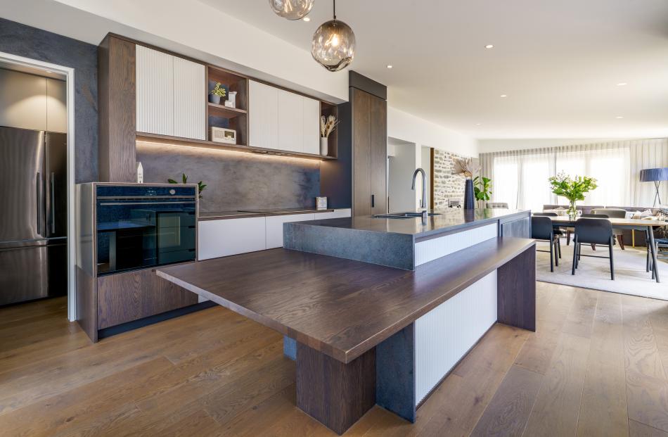 Timber adds texture and colour to a Wānaka kitchen, designed by Hannah Withy of HM design, Wānaka...