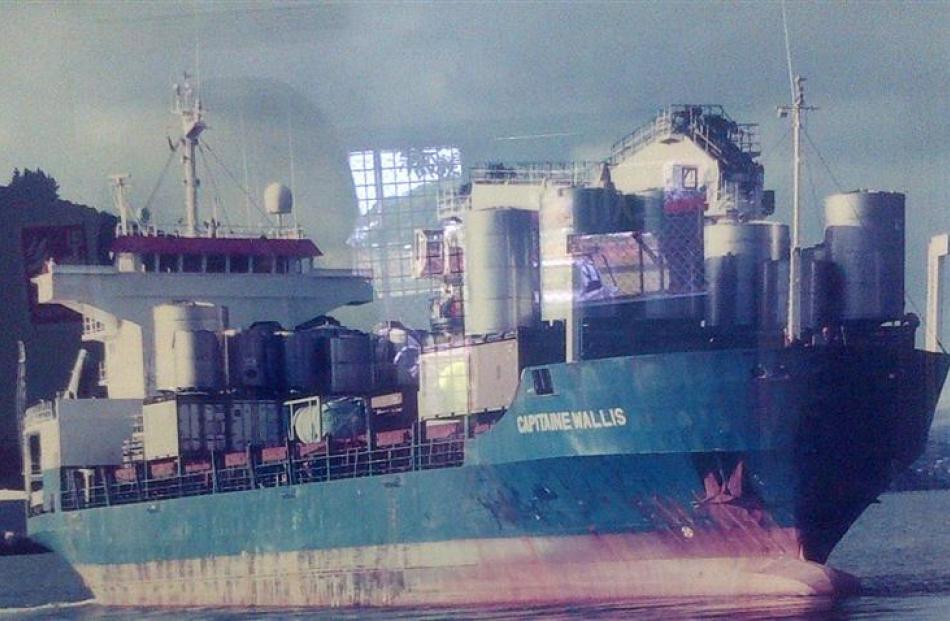 The container ship Capitaine Wallis,  laden with equipment from Wilson's Distillery, leaves...