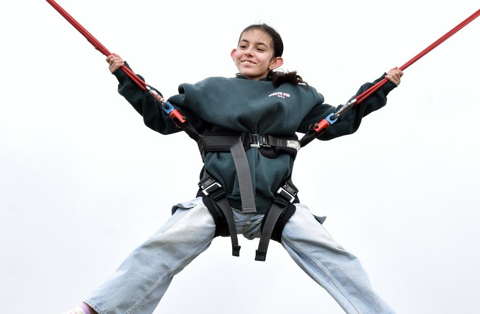 Enjoying a bungee trampoline during the 2025 Brighton Gala Day is Ashley John, 11, of Dunedin....