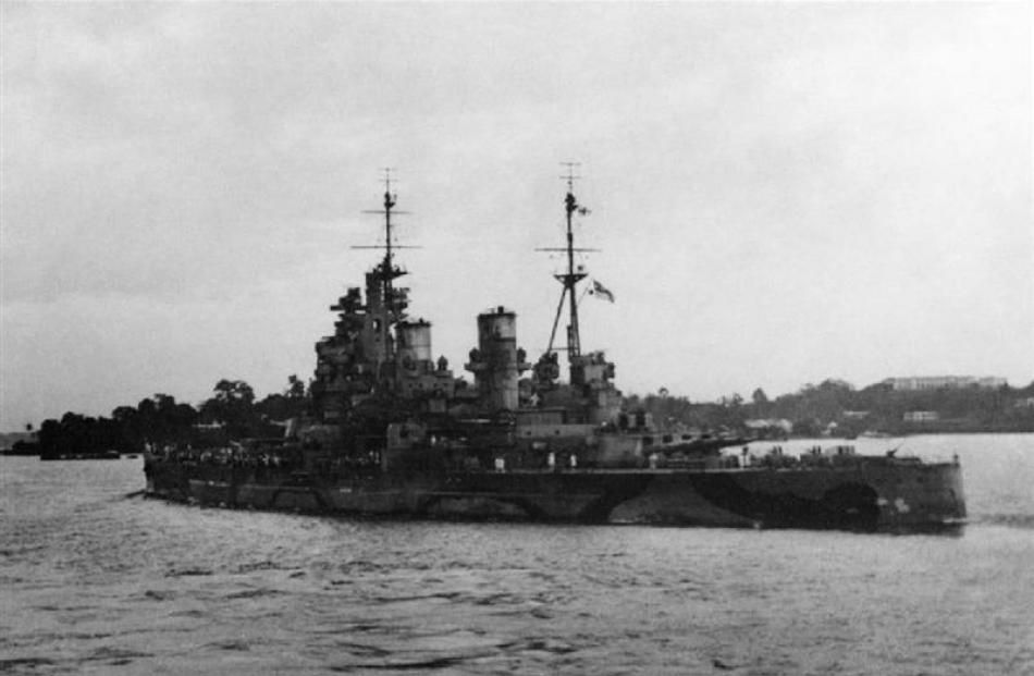 The Royal Navy battleship HMS Prince of Wales leaves Singapore on 8 December 8, 1941 for its...