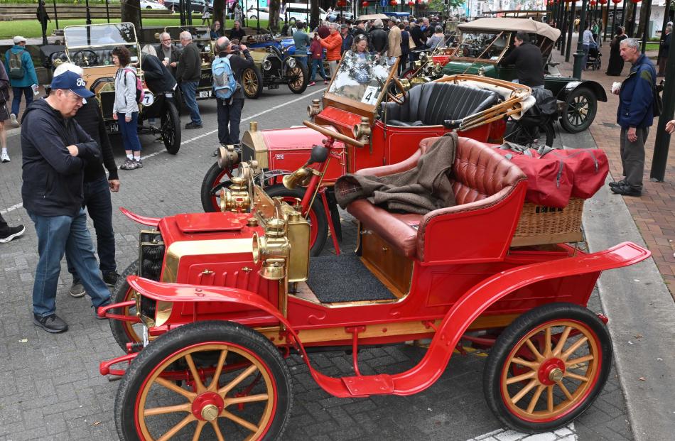 Spectators get a closer look at the vintage cars before the Brighton Rally began.