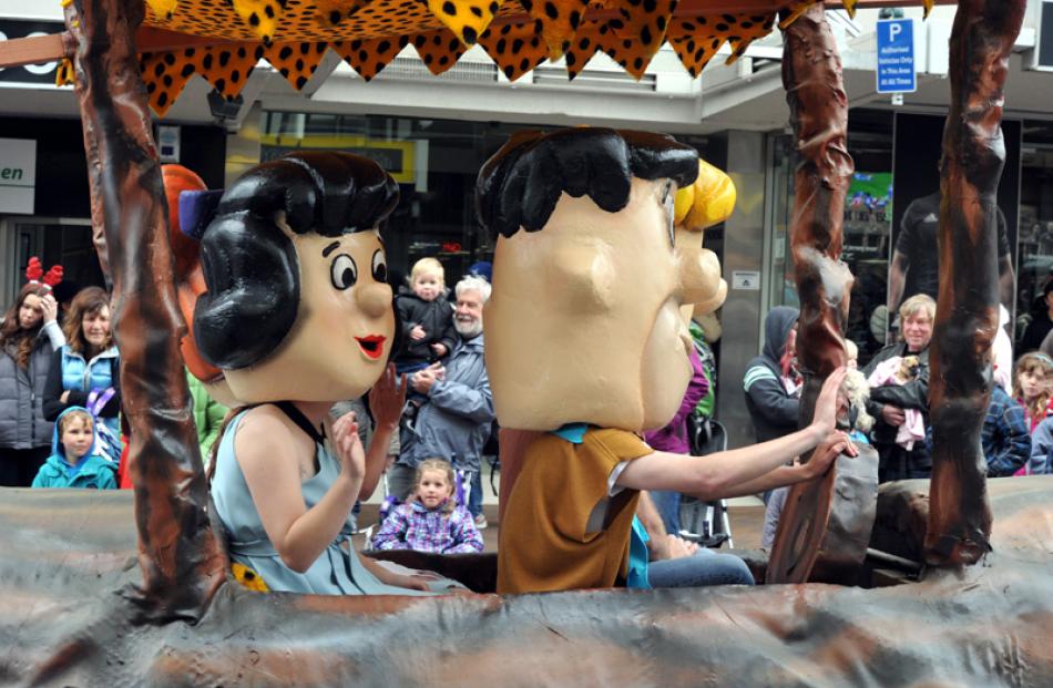 Fred Flintstone and Betty.