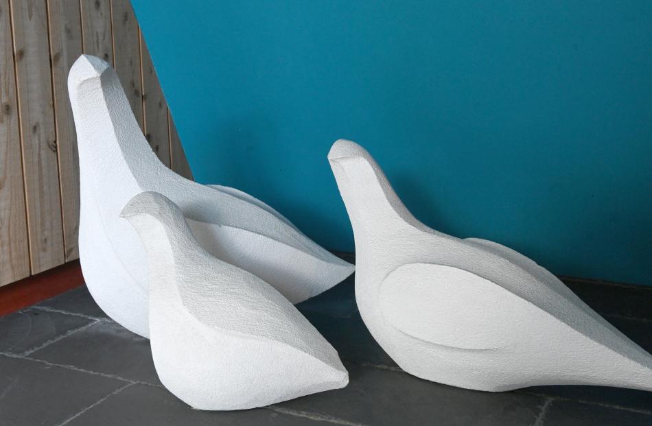 The stylised birds at the entry were carved from Oamaru stone by one of the owners.