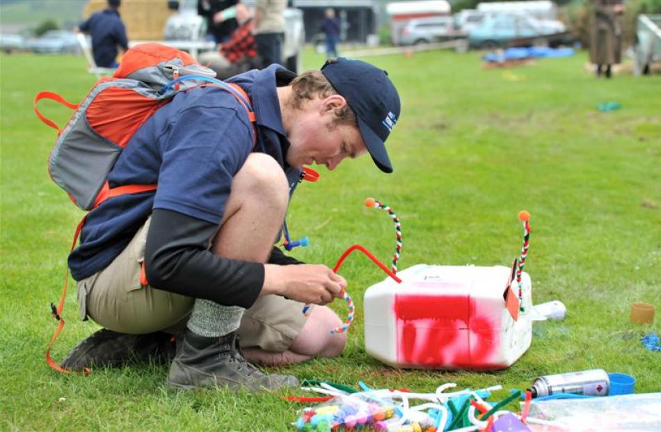 Logan Wallace, of Waipahi, makes a letterbox.