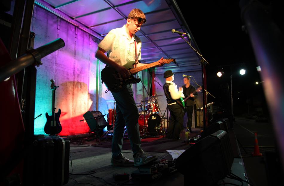 Jack Harrison performing with local band VHS at Retro Rock 2024.