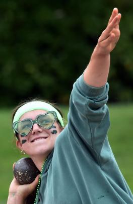 Ella Rowe, 17, puts her all into the shot put.