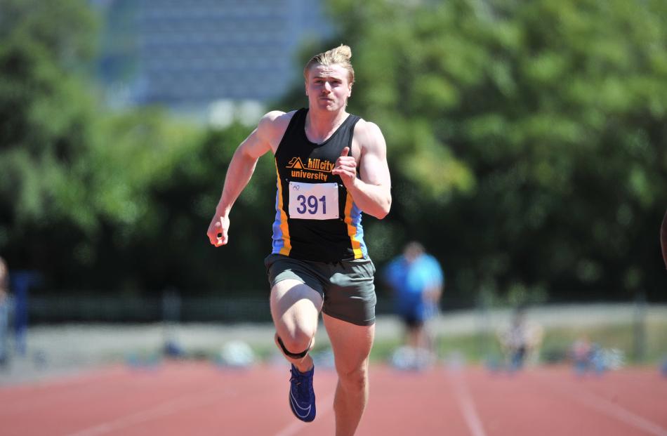 John Gerber takes part in the senior men's 100m final.