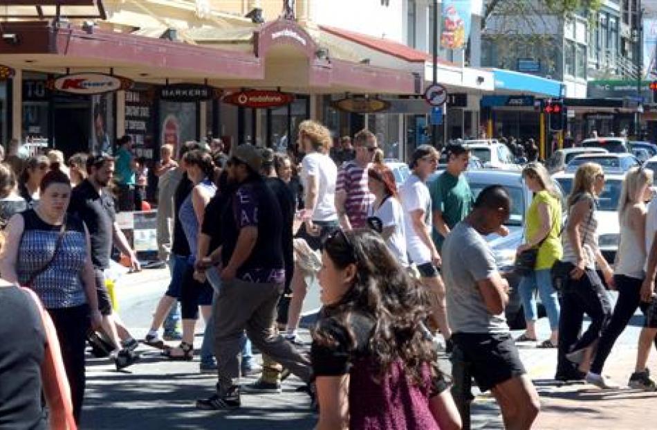 A busy George St as shoppers make their way down Dunedin's main shopping strip.