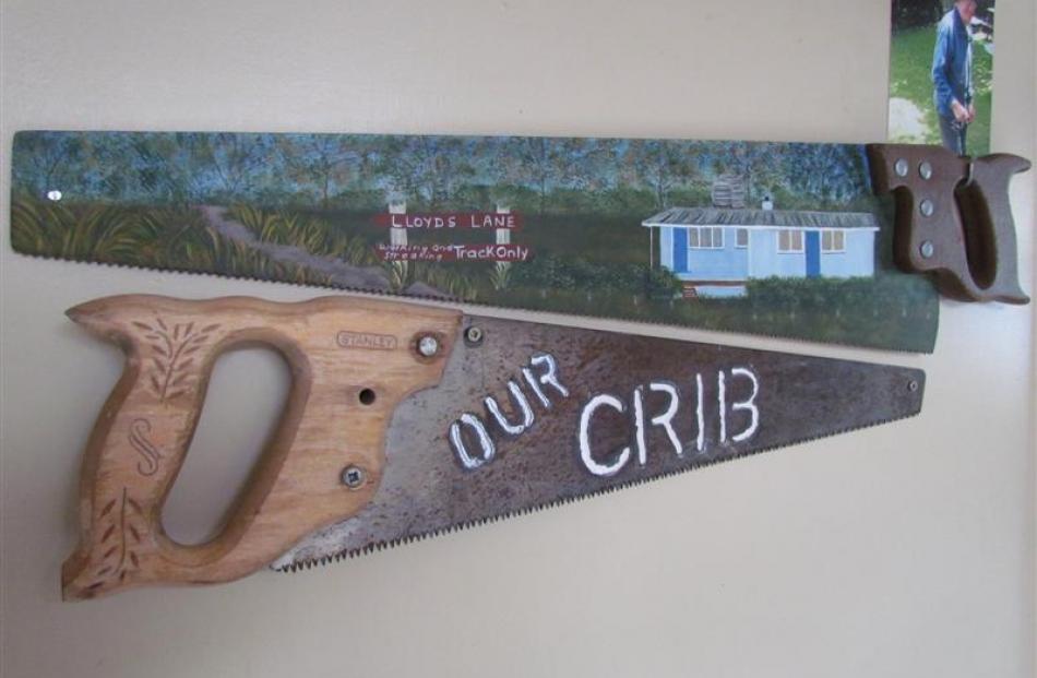 Made by  family members for Mr Clarke, these decorated saws recognise his skills as a carpenter.