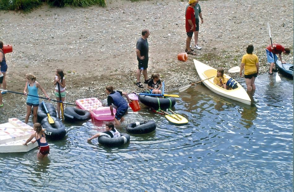 The camp gets ready for its annual raft, canoe and tube race day. Photo by Clarke family.