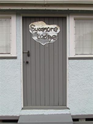 The original entry door to the bach, named after the sycamore trees on the section.