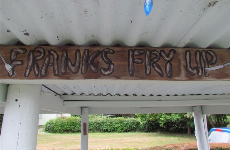 The sign says it all on Frank's barbecue pad.