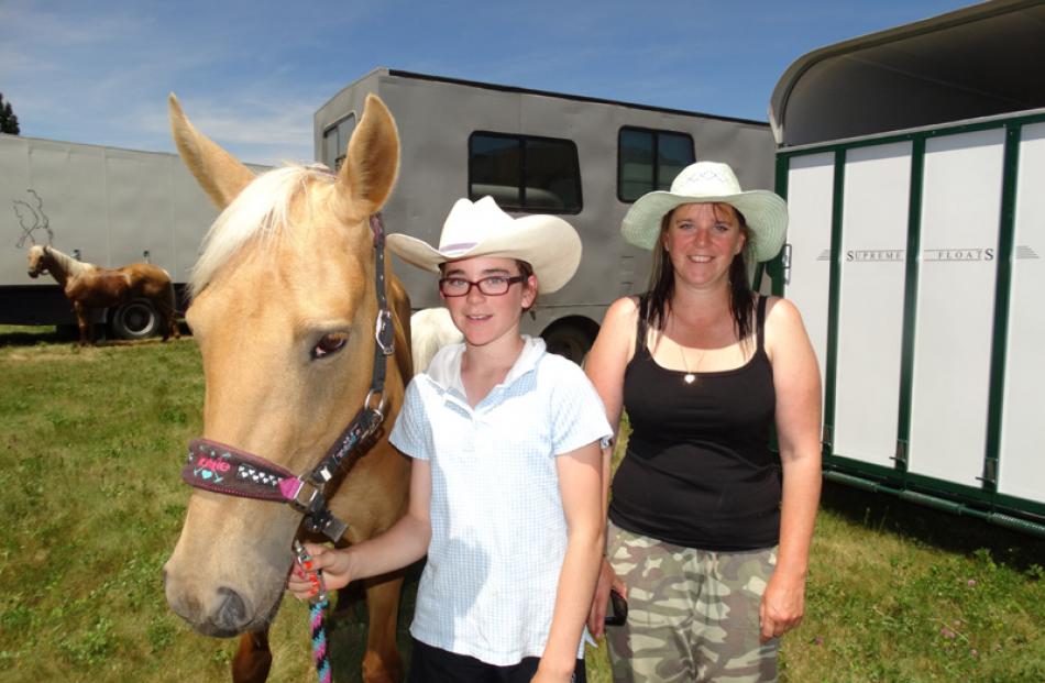 Molly the pony with owner Molly Todd (12) and her mother Emily, both of Hawea Flat.