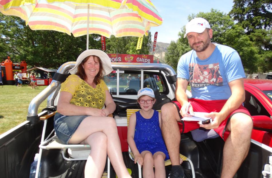 Julie, Jorja (9) and Brendon Westland, of Rolleston, had a good view of the field action from the...