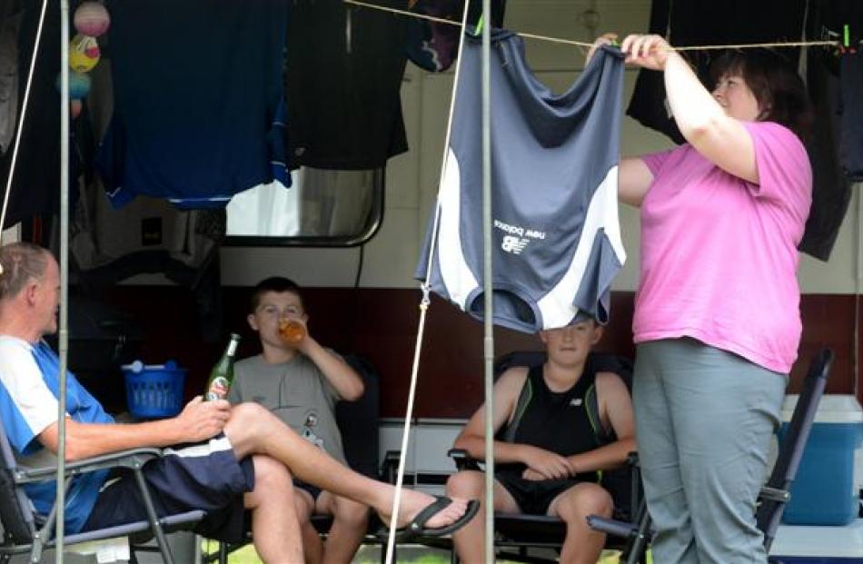 Annette McNicholl and (from left at rear) Richard, Scott (11) and Jack (12) McNicholl, all of...