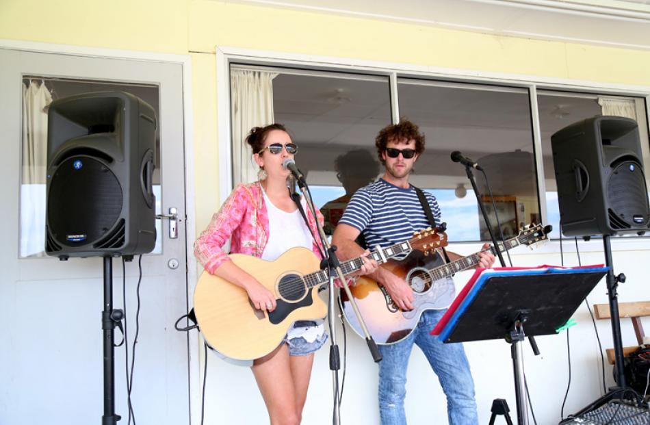 Kurow racegoers were entertained by Kaylee Bell (left) and Cam Scott.