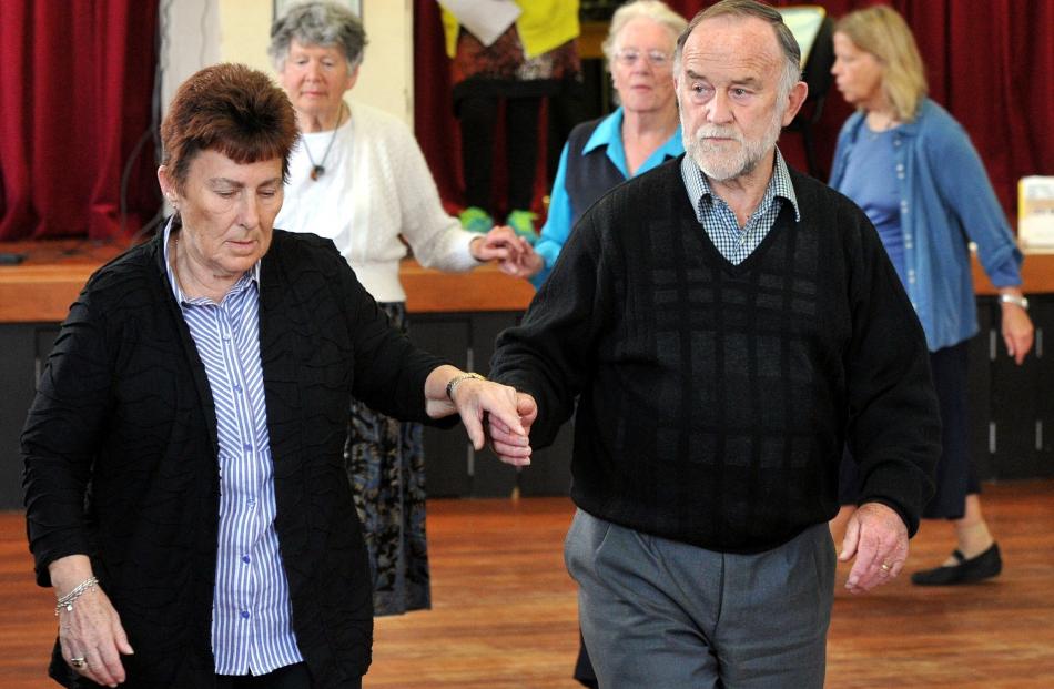 Leona Hurndell and Russell Kidd move during a square dance. Photo by Gregor Richardson.