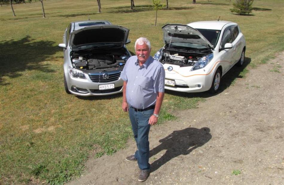 Electric vehicle importer Terry Stewart, of EV Imports Ltd, of Alexandra, stands in front of his...